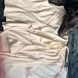 Elegant Cream Sleeveless Blouse w/ Matching Trousers